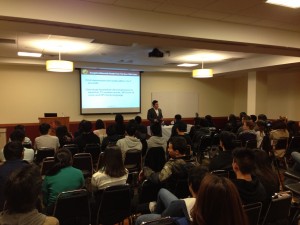 JT Tran gives his keynote presentation to the students of Northeastern University